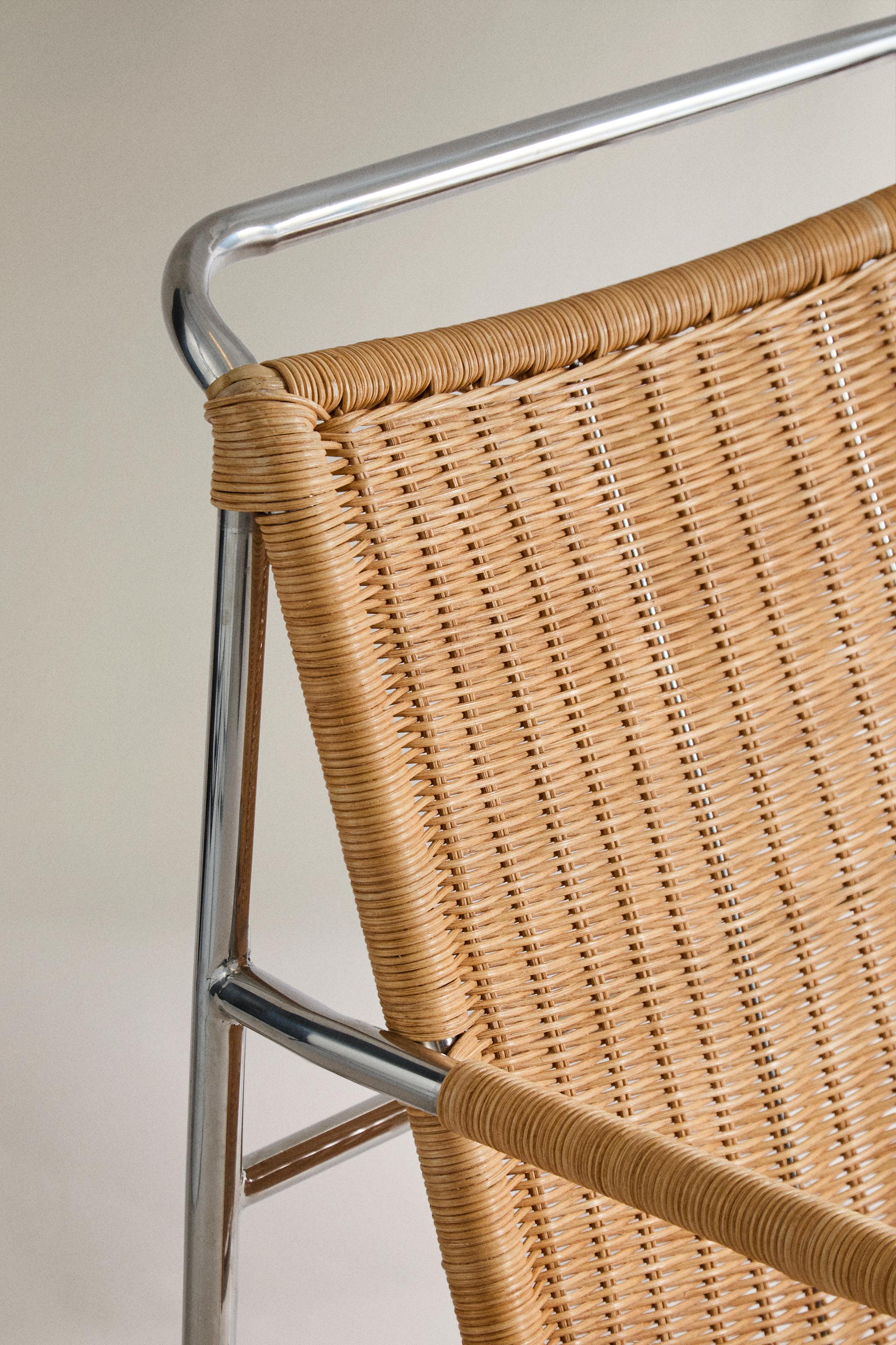 RATTAN AND STEEL ACCENT CHAIR